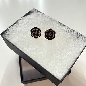 Authentic Chanel buttons revamped into earrings!
